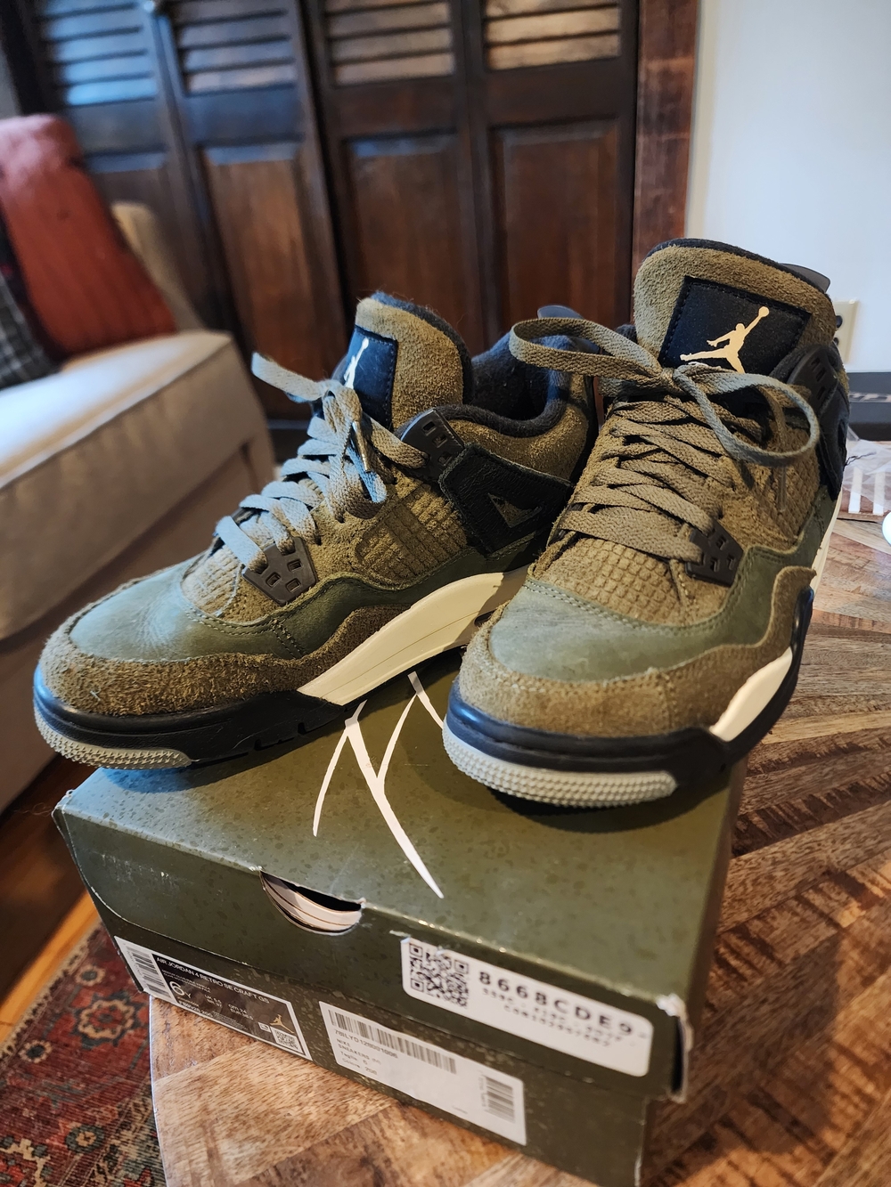 Air Jordan 4 Retro Olive Green Suede Sneakers